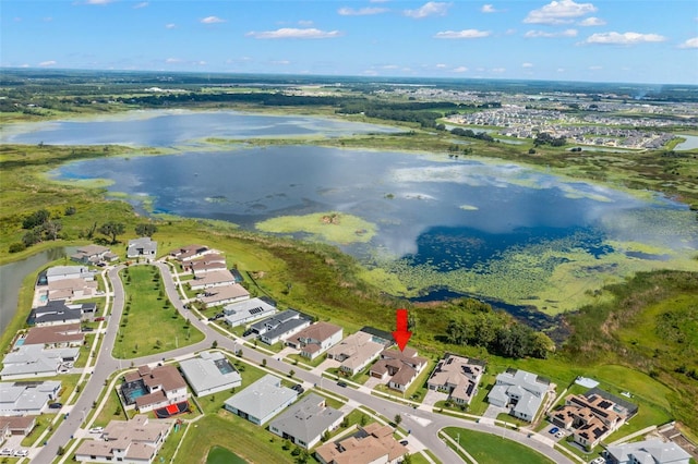 aerial view with a water view and a residential view