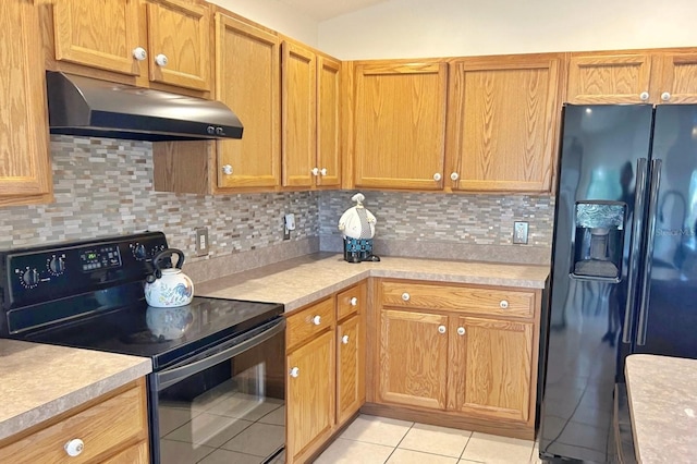 11416 Billingham Blvd, Spring Hill, FL 34609 - kitchen featuring black appliances, under cabinet range hood, light countertops, and light tile patterned floors