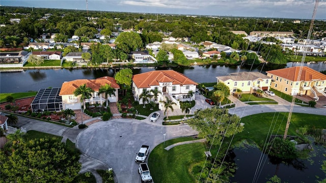 birds eye view of property featuring a water view