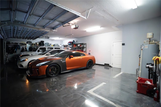 garage with a garage door opener and water heater