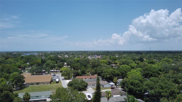 aerial view with a wooded view