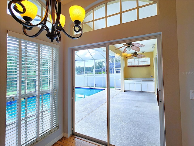 view of swimming pool featuring ceiling fan