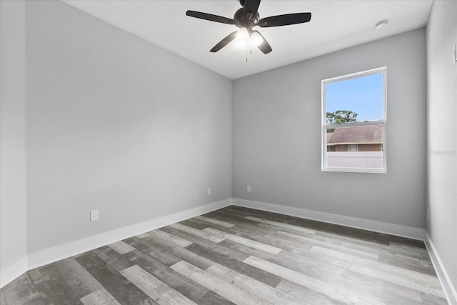 empty room featuring light hardwood / wood-style flooring and ceiling fan