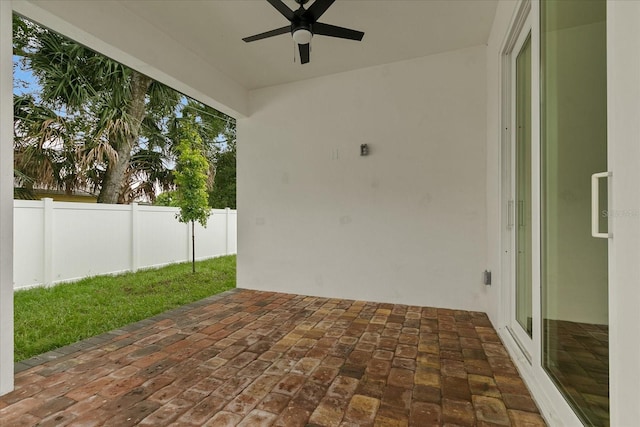 view of patio / terrace featuring ceiling fan