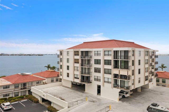 view of building exterior featuring a water view