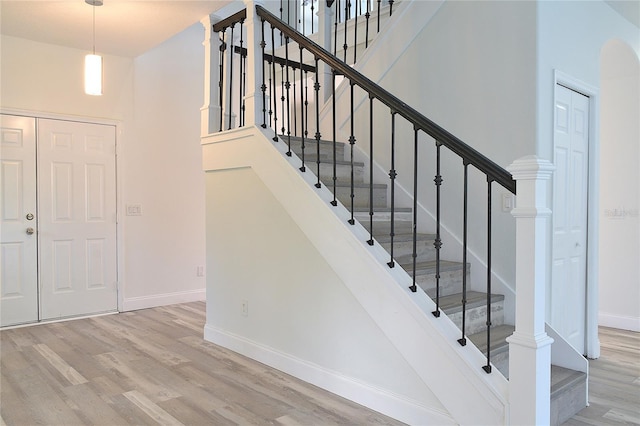 5308 Cedarshake Ln, Valrico, FL 33596 - stairway with wood finished floors and baseboards