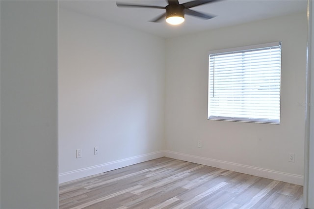 unfurnished room with light hardwood / wood-style flooring and ceiling fan