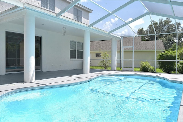 view of pool featuring a patio and a lanai