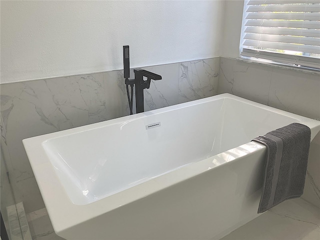 5308 Cedarshake Ln, Valrico, FL 33596 - bathroom featuring a bathing tub
