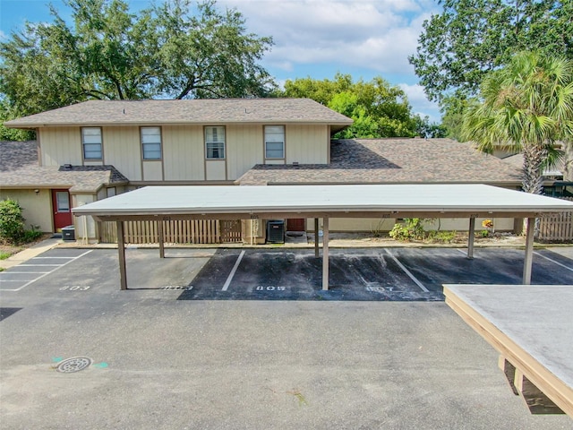 exterior space featuring a carport