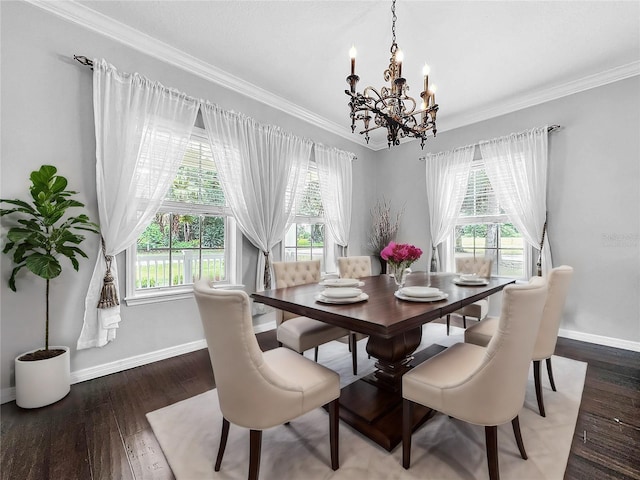 dining space featuring plenty of natural light, an inviting chandelier, and dark hardwood / wood-style flooring