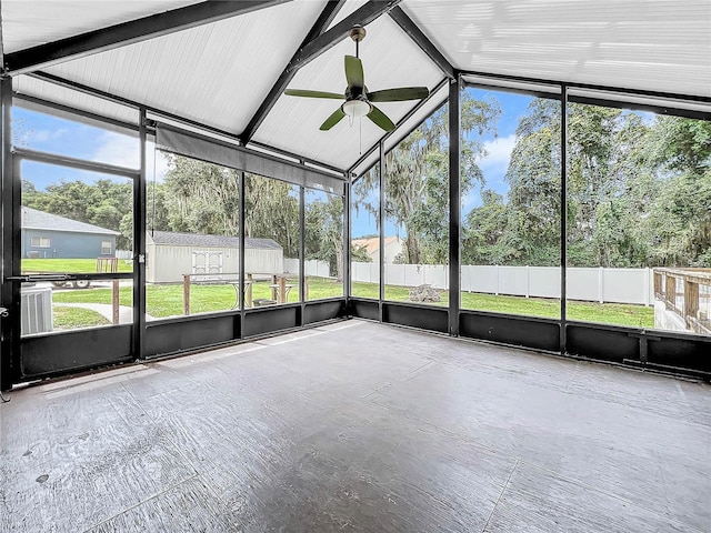 unfurnished sunroom featuring vaulted ceiling and ceiling fan