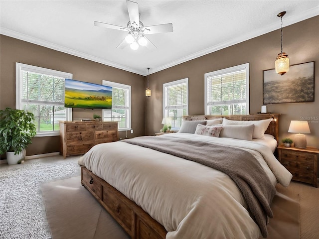 carpeted bedroom featuring crown molding, ceiling fan, and multiple windows