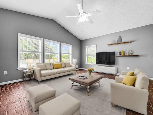 living room featuring lofted ceiling and ceiling fan