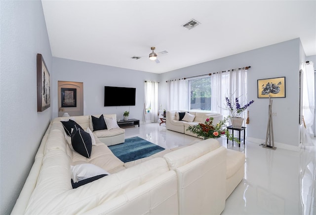 living room featuring ceiling fan