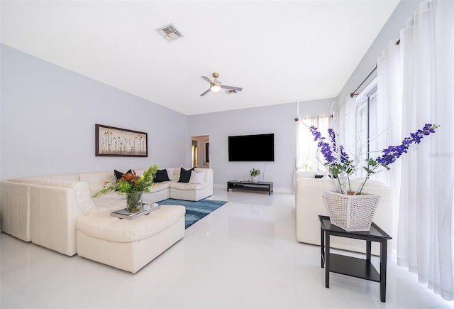 living room with ceiling fan