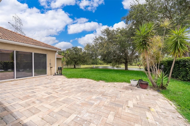 view of patio / terrace featuring a water view