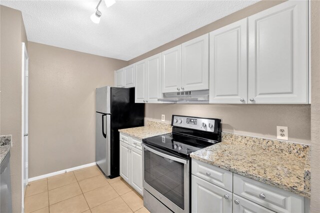 kitchen with appliances with stainless steel finishes, a textured ceiling, and white cabinetry