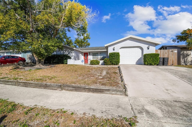 single story home with a garage