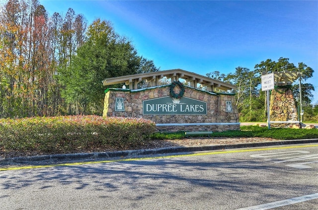 view of community sign