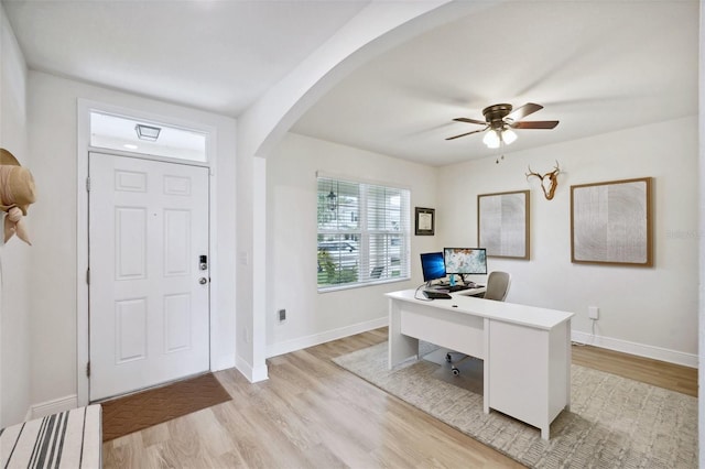 office area with ceiling fan and light hardwood / wood-style flooring