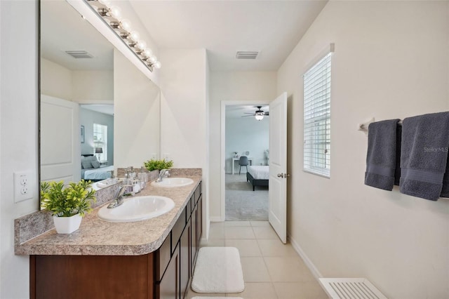 bathroom with ceiling fan, tile patterned flooring, and vanity