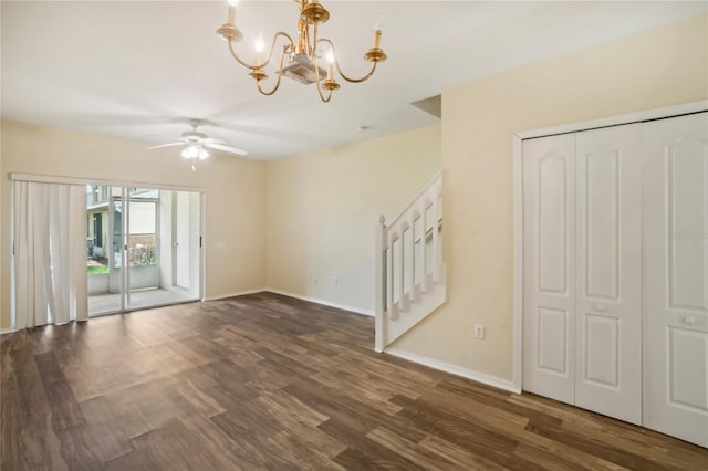 interior space with a closet, a notable chandelier, access to outside, and hardwood / wood-style floors