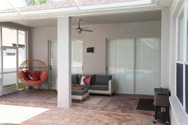 view of patio featuring ceiling fan