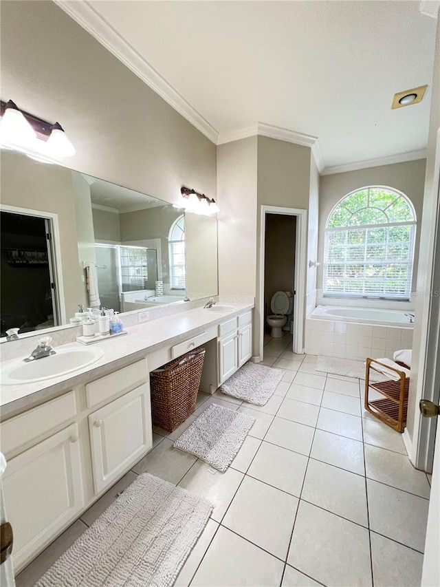 full bathroom featuring toilet, tile patterned flooring, plus walk in shower, ornamental molding, and vanity