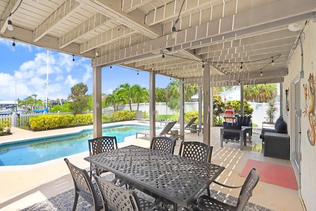 view of patio featuring a fenced in pool