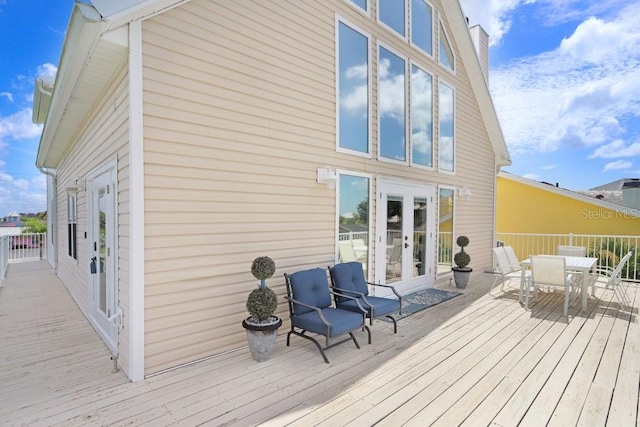 wooden deck with french doors