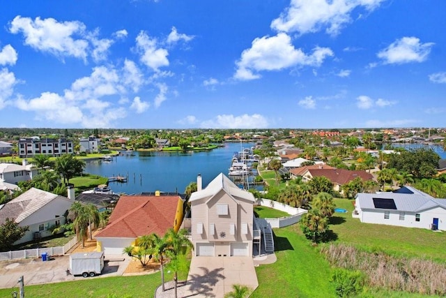 drone / aerial view with a water view