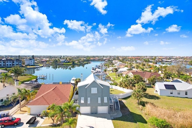 aerial view featuring a water view and a residential view