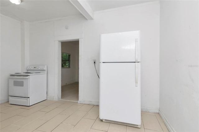 kitchen featuring white appliances and beam ceiling