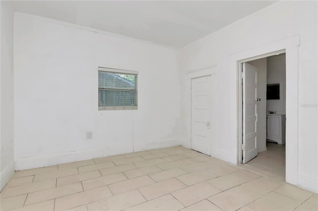 tiled empty room with ornamental molding