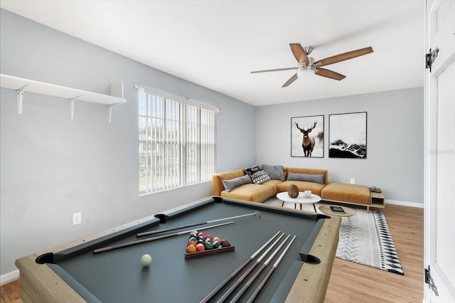 recreation room featuring a ceiling fan, pool table, baseboards, and wood finished floors