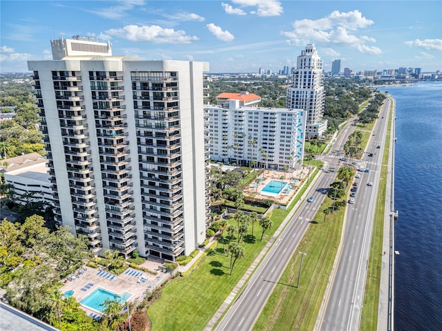 birds eye view of property with a water view