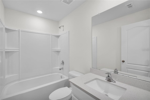 full bathroom with tub / shower combination, toilet, and vanity