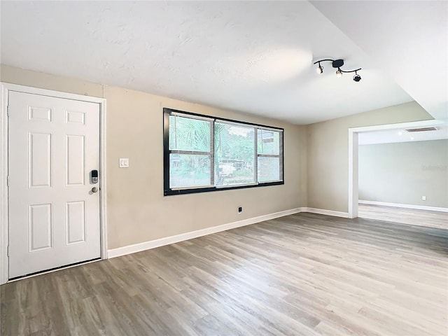 interior space with light hardwood / wood-style floors