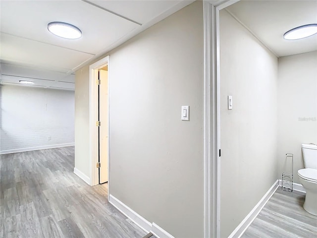 hallway featuring light hardwood / wood-style flooring