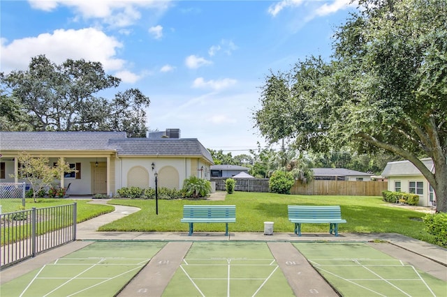 view of home's community featuring a yard