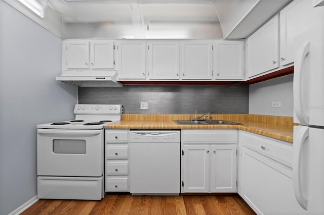 kitchen featuring white cabinetry, light hardwood / wood-style floors, white appliances, and sink