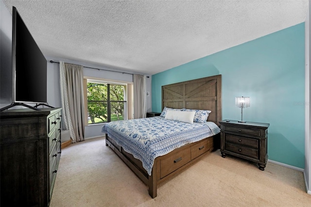 carpeted bedroom with a textured ceiling