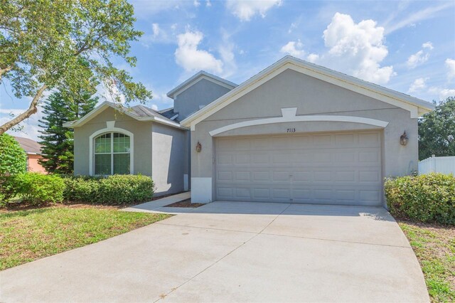 ranch-style house with a garage