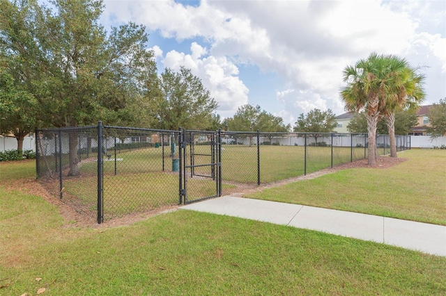 view of community featuring a yard