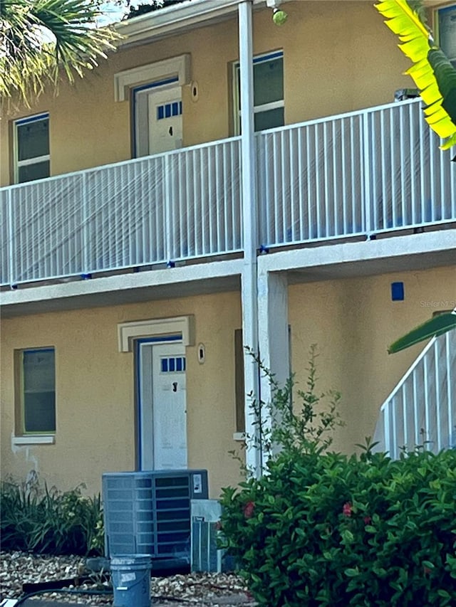 doorway to property featuring a balcony