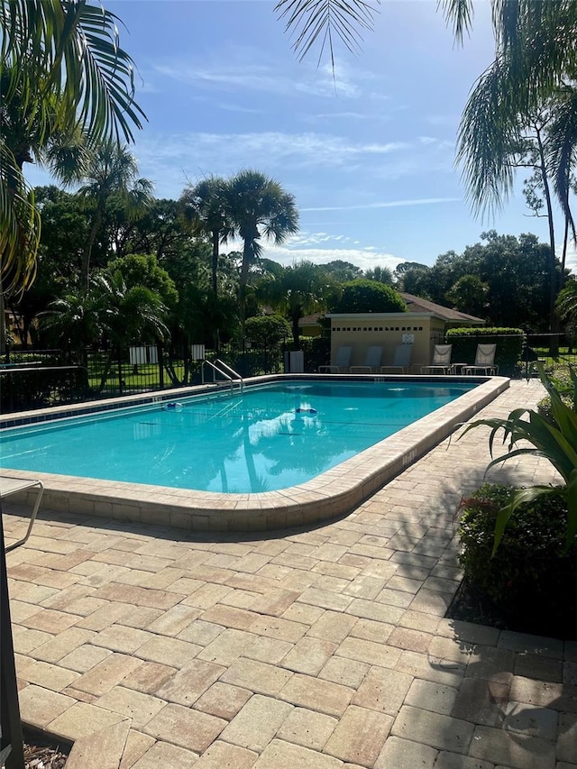 view of pool featuring a patio area