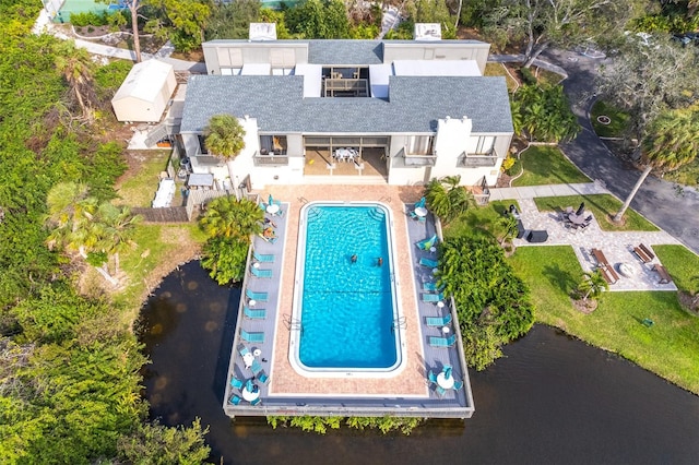 bird's eye view with a water view