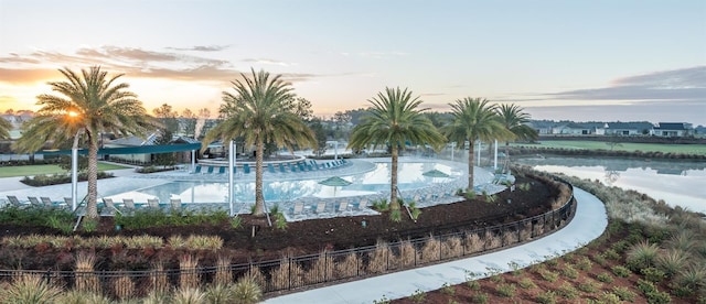 surrounding community featuring a water view