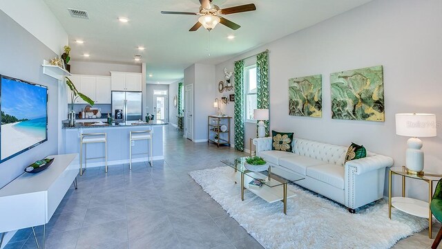 4067 NW 44th Cir, Ocala, FL 34482 - living room featuring a ceiling fan, recessed lighting, and light tile patterned flooring